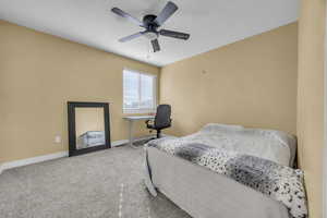 Bedroom featuring carpet floors and ceiling fan