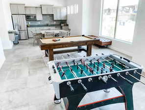 Recreation room featuring sink and billiards