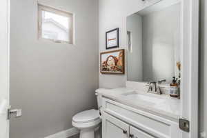 Bathroom with vanity and toilet