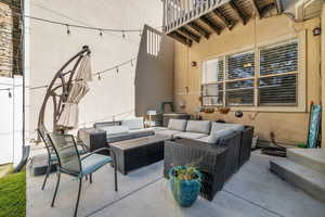 View of backyard patio accessible from the kitchen