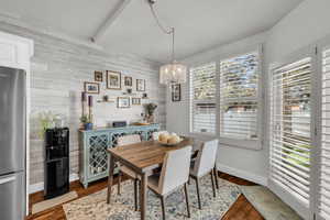 Dining space with a wealth of natural light and doors to back yard