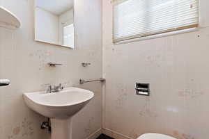 Bathroom with tile walls