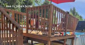 Wooden deck with an outdoor pool