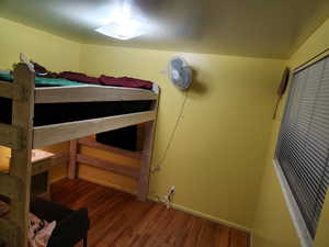 Bedroom with hardwood floors