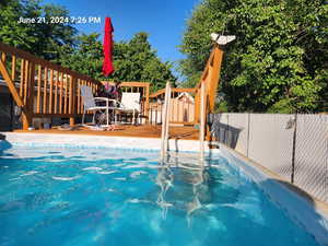 View of swimming pool with deck