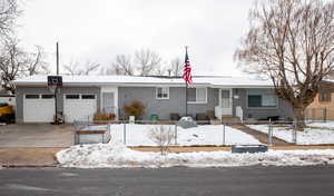 Ranch-style home with a garage