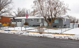 Single story home with a garage