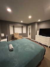 View of carpeted bedroom