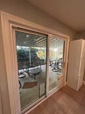 Doorway featuring hardwood / wood-style flooring