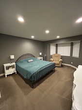 Bedroom featuring carpet floors