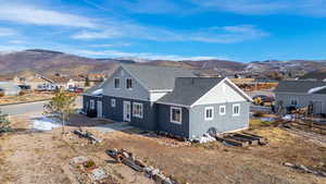 View of front of house featuring a mountain view