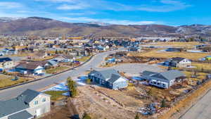 Birds eye view of property with a mountain view