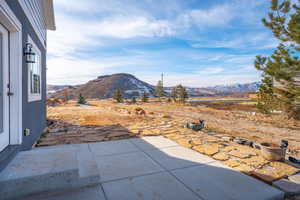 View of patio / terrace featuring a mountain view