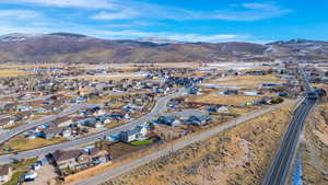 Birds eye view of property featuring a mountain view