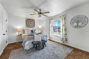 Bedroom featuring carpet flooring and ceiling fan