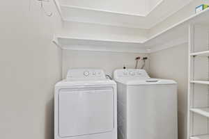 Laundry room featuring washer and dryer