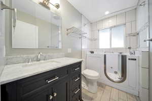 Bathroom with vanity and toilet