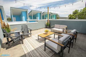 View of patio featuring an outdoor living space.