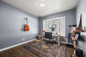 Office with wood-type flooring