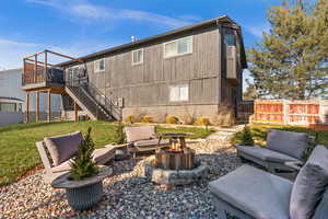 View of patio / terrace featuring a wooden deck and an outdoor living space