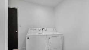 Clothes washing area with washing machine and dryer