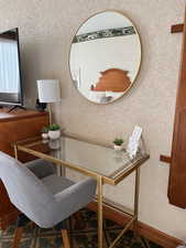 Office area featuring carpet floors