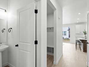 Bathroom with wood-type flooring