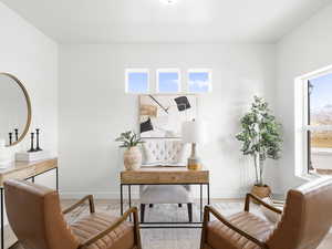 Living area featuring hardwood / wood-style floors and a wealth of natural light