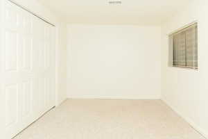 View of carpeted spare room