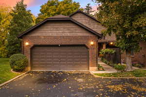 View of front facade featuring a garage