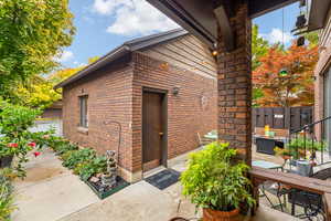 View of detached garage entry door