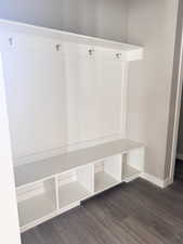 Mudroom with dark wood-type flooring