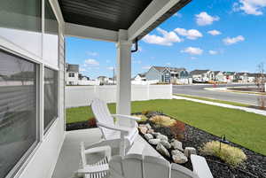 View of patio with covered porch