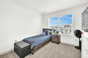 View of carpeted bedroom