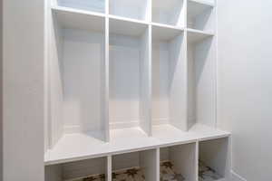 Mudroom featuring tile patterned flooring