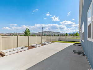 View of patio featuring a mountain view