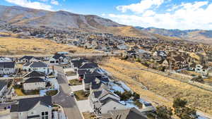 Birds eye view of property with a mountain view