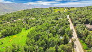 Drone / aerial view featuring a mountain view