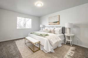 Bedroom featuring carpet floors