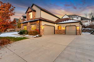 View of front of property featuring a garage