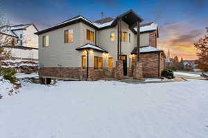 View of snow covered property