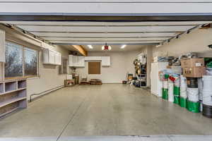 Garage featuring a garage door opener