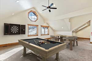 Recreation room featuring carpet, ceiling fan, billiards, and vaulted ceiling