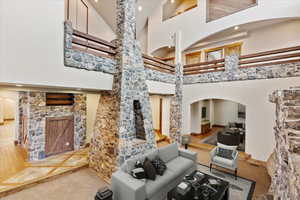 Living room featuring a high ceiling