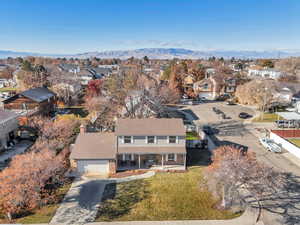 Birds eye view of property with a mountain view