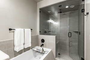 Bathroom with plus walk in shower