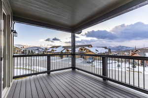 Wooden deck featuring a mountain view