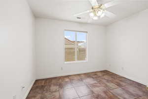 Spare room/den featuring ceiling fan