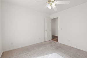 2nd bedroom with ceiling fan