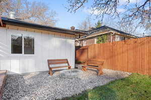 View of yard featuring a fire pit